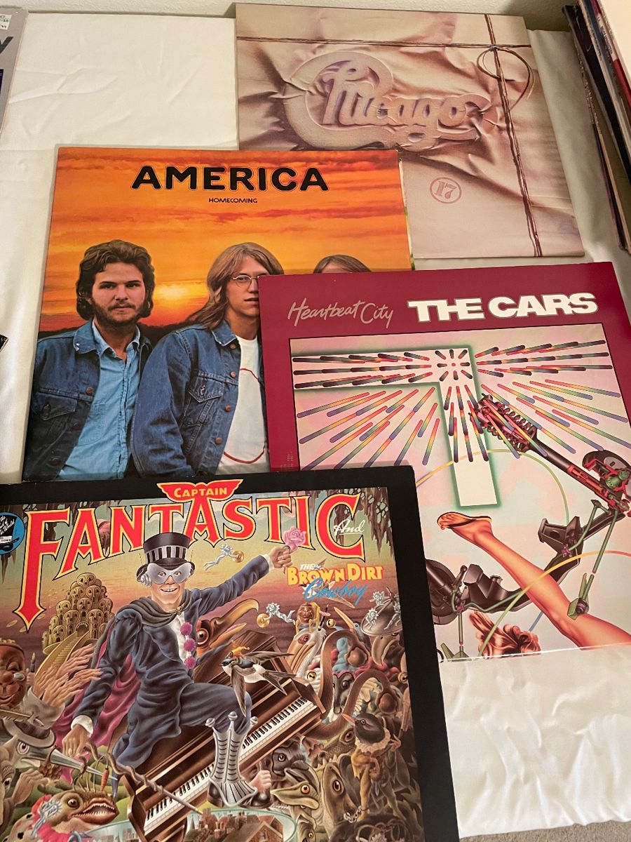 Vintage vinyl records by Elton John, America and The Cars