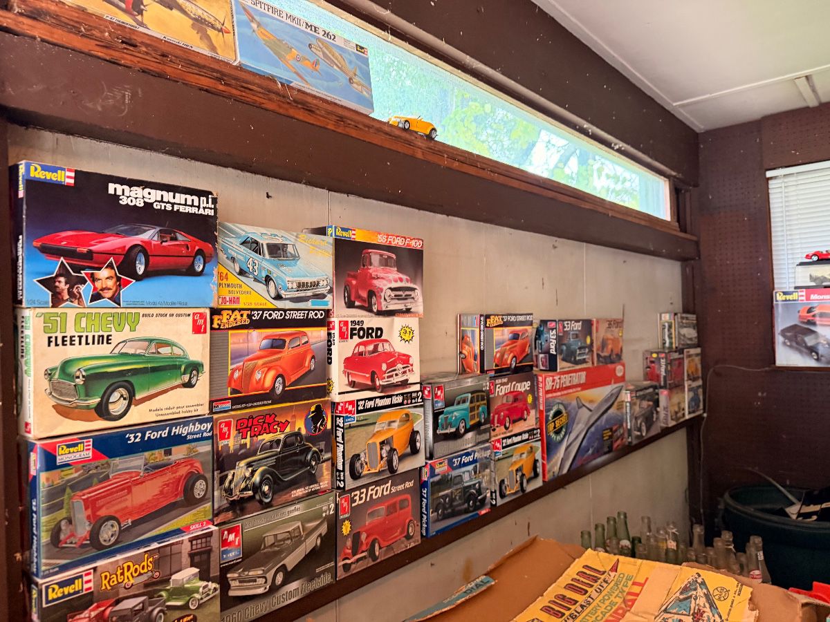 Wall of vintage model car kits