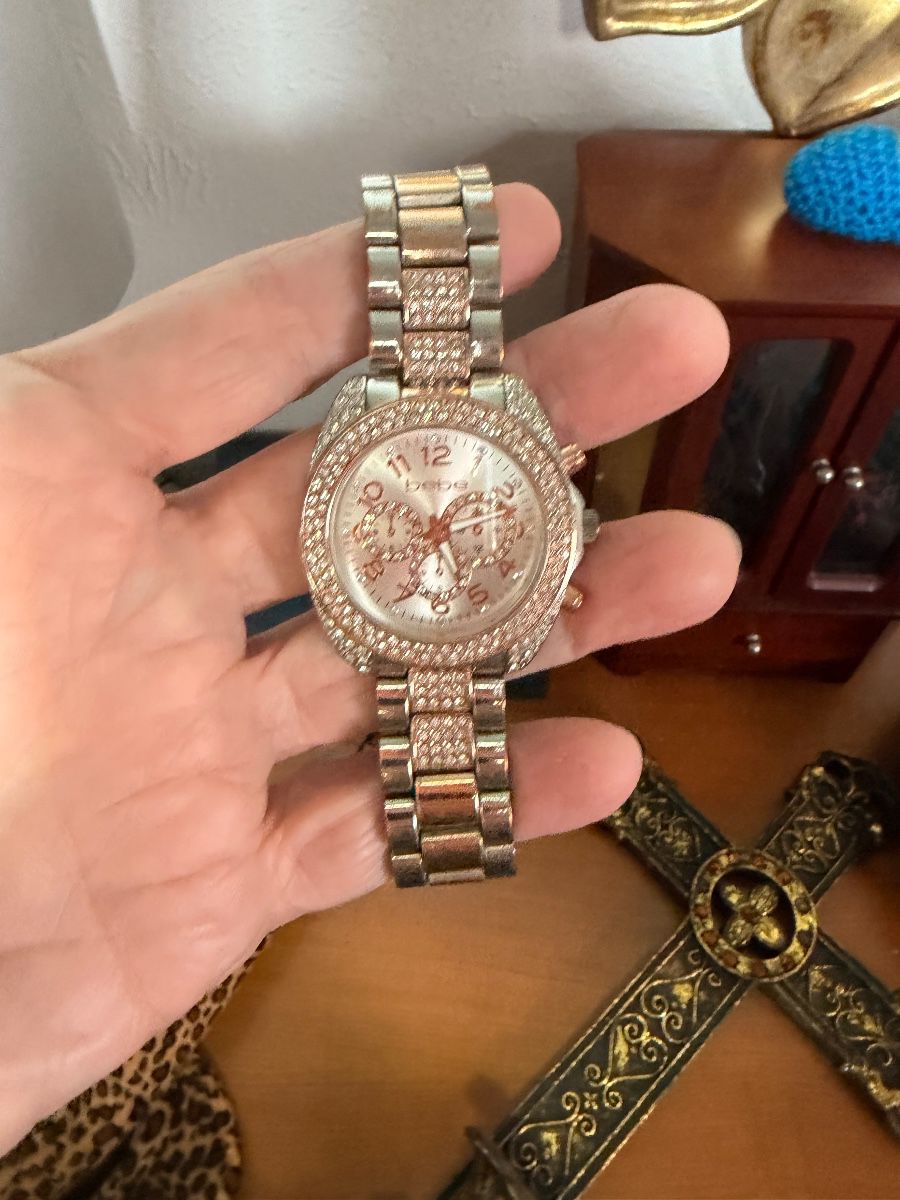 Women's crystal embellished silver tone wristwatch
