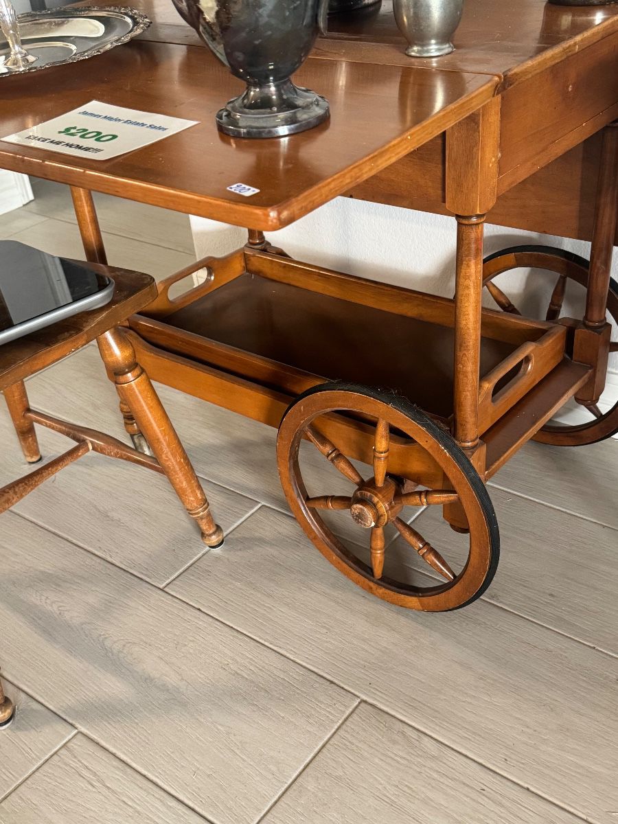 Wooden tea cart on wagon wheels with a drop-leaf top